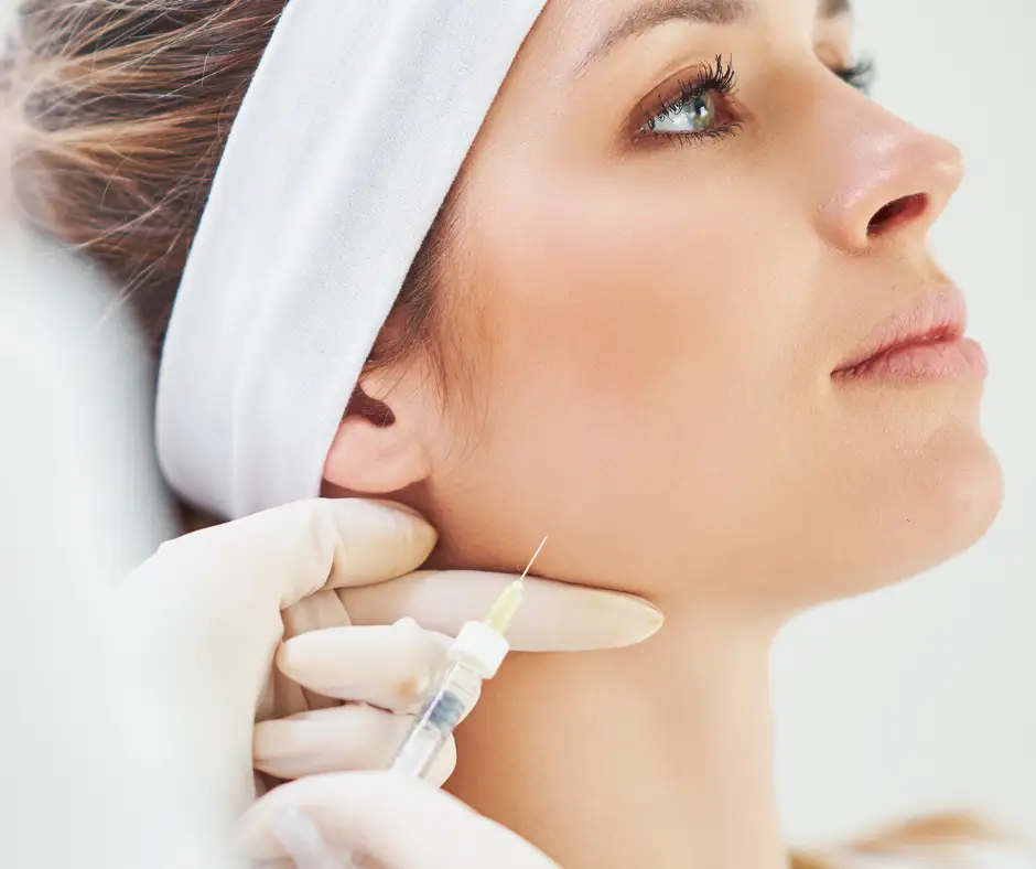 woman getting jawline injection Jawline Contouring with JUVÉDERM