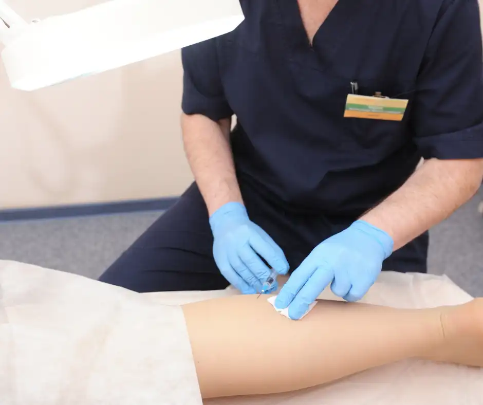 doctor injecting sclerotherapy to patient